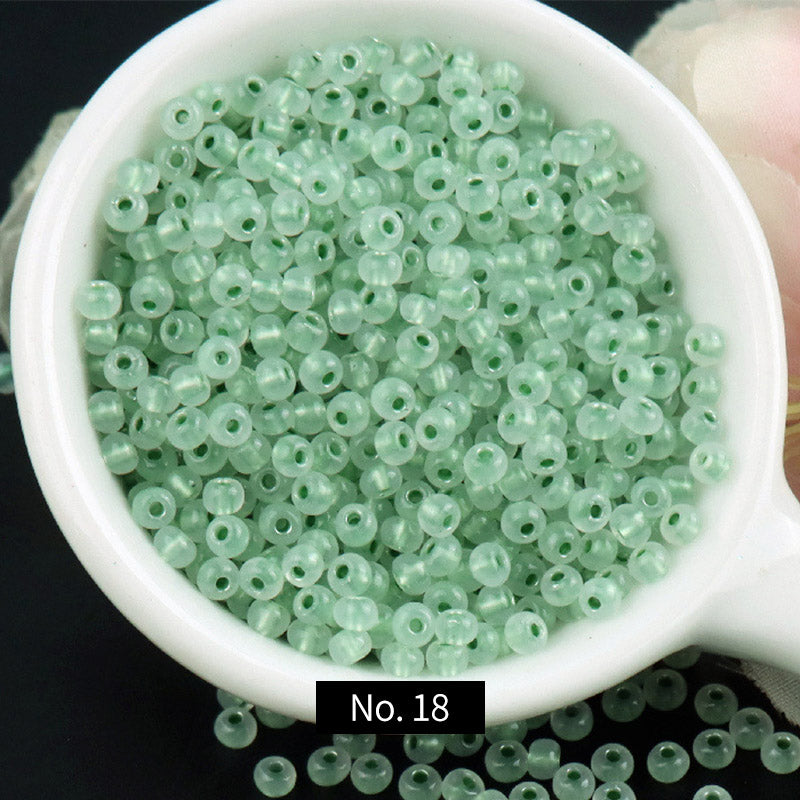 Cuentas de semillas de vidrio con núcleo de color translúcido de 3 mm, 10 g, MBSE1021